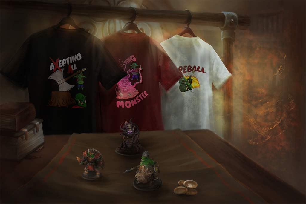 Tre magliette fantasy e miniature esposte nella bottega di Arcana Labs